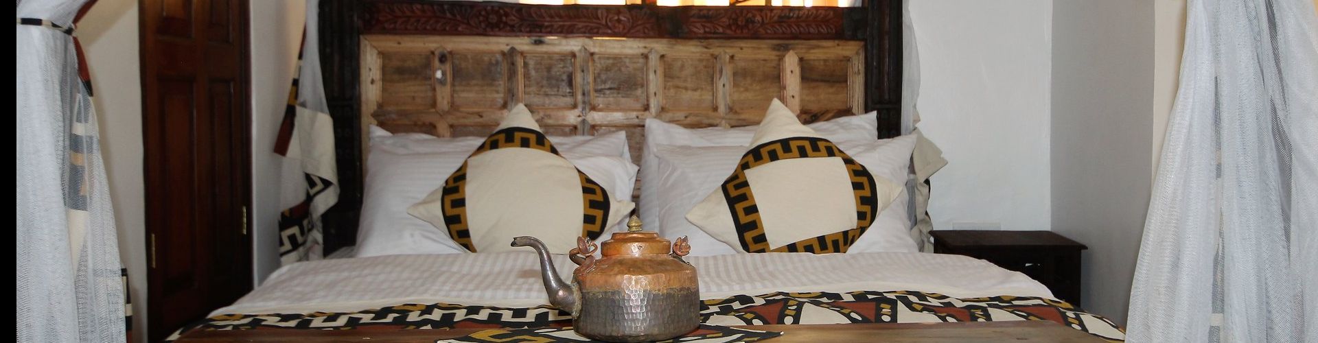 Kingsize bed in Shaba Boutique accommodatie in Zanzibar Stone Town